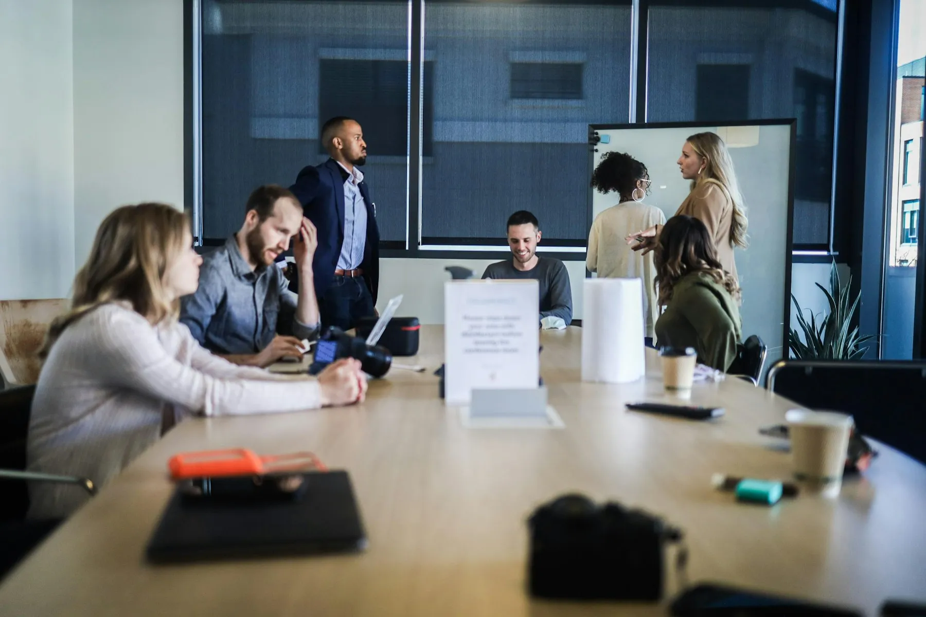 People listening at a table